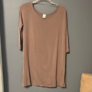 Brenda’s tan tunic